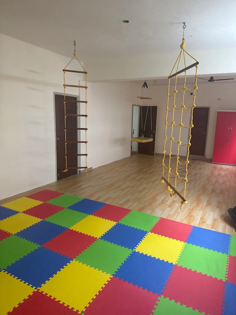 Sensory therapy room with climbing ropes