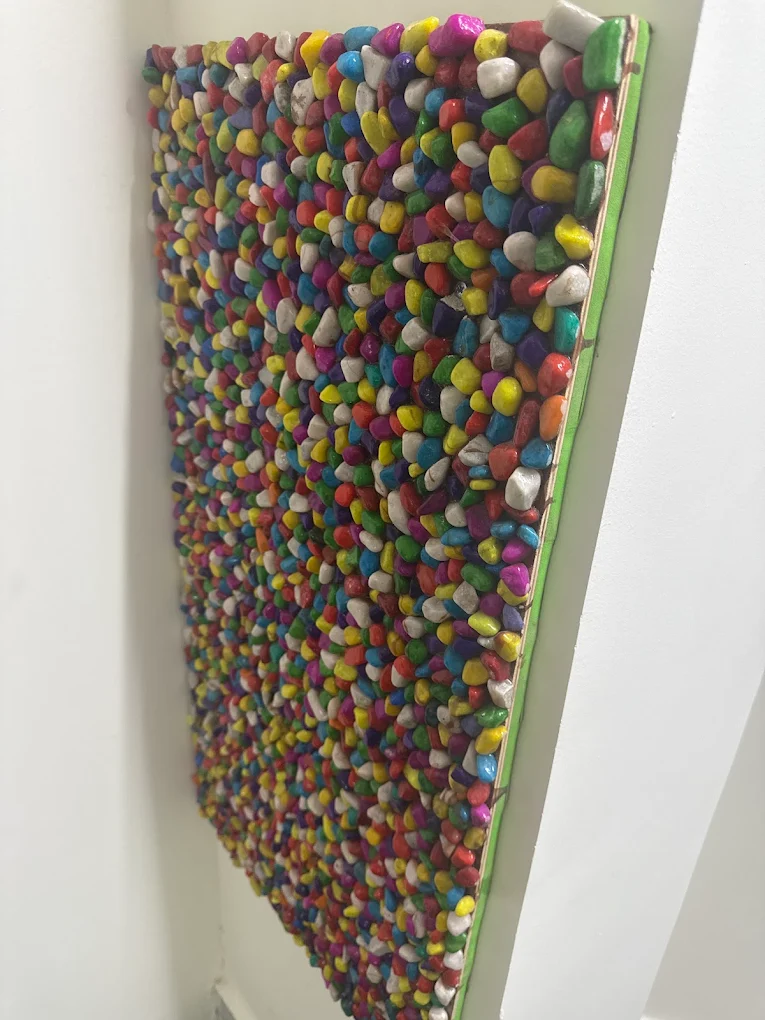 Colourful pebble sensory wall