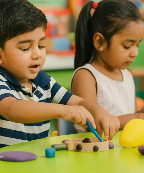 Children engaged in a hands-on play-based learning activity