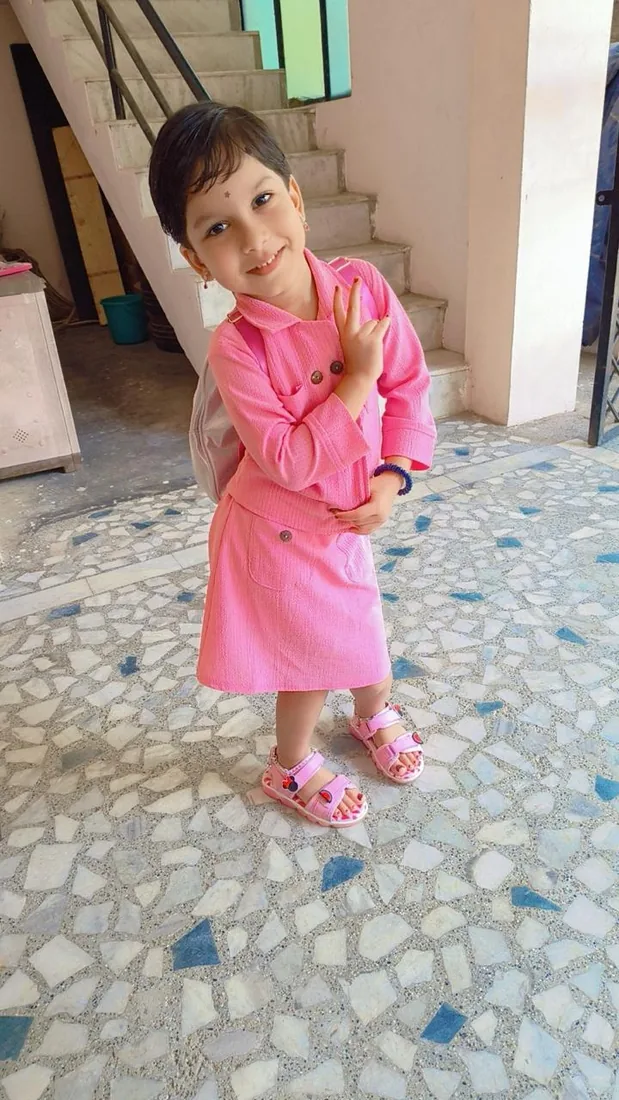 A warm welcome from a happy child