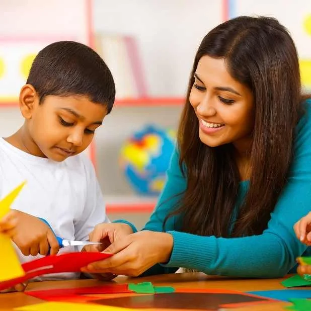 A therapist guiding a child with care